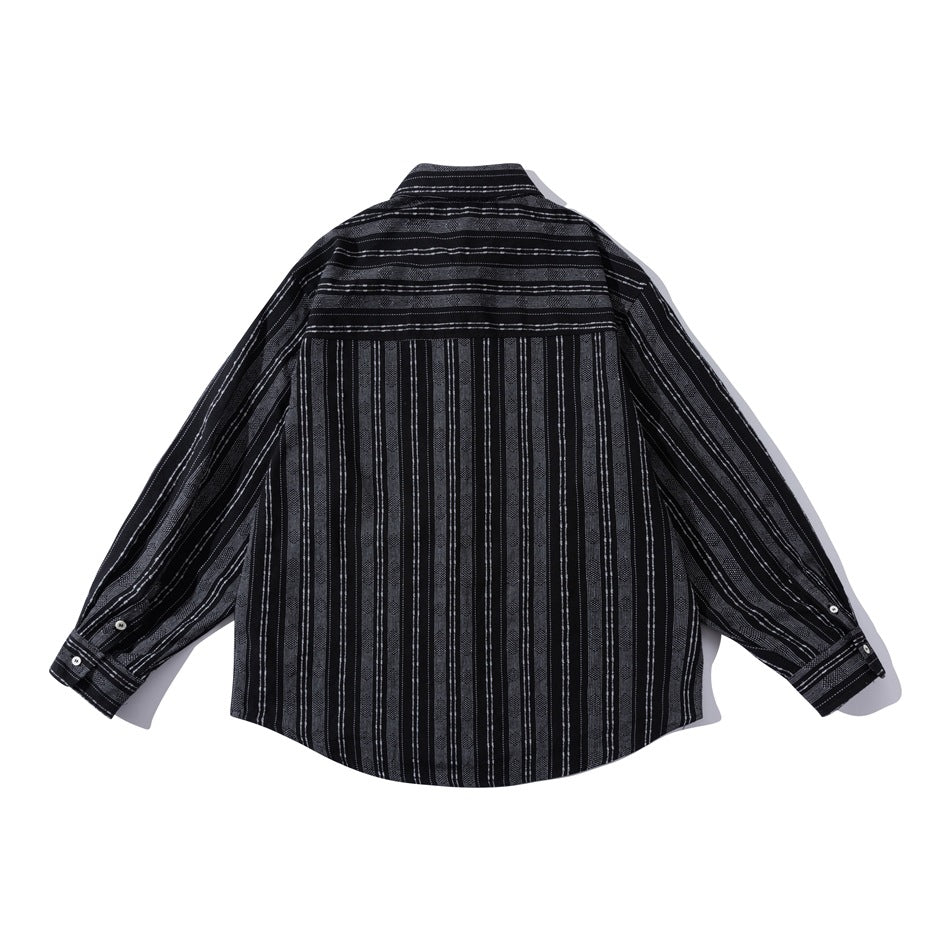 Back view of a black long-sleeve button-up shirt with vertical gray stripes, spread flat on a white background.