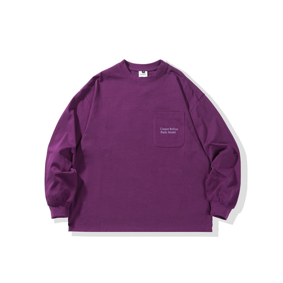 Front view of a purple long-sleeve crewneck shirt with a chest pocket and small English text.
