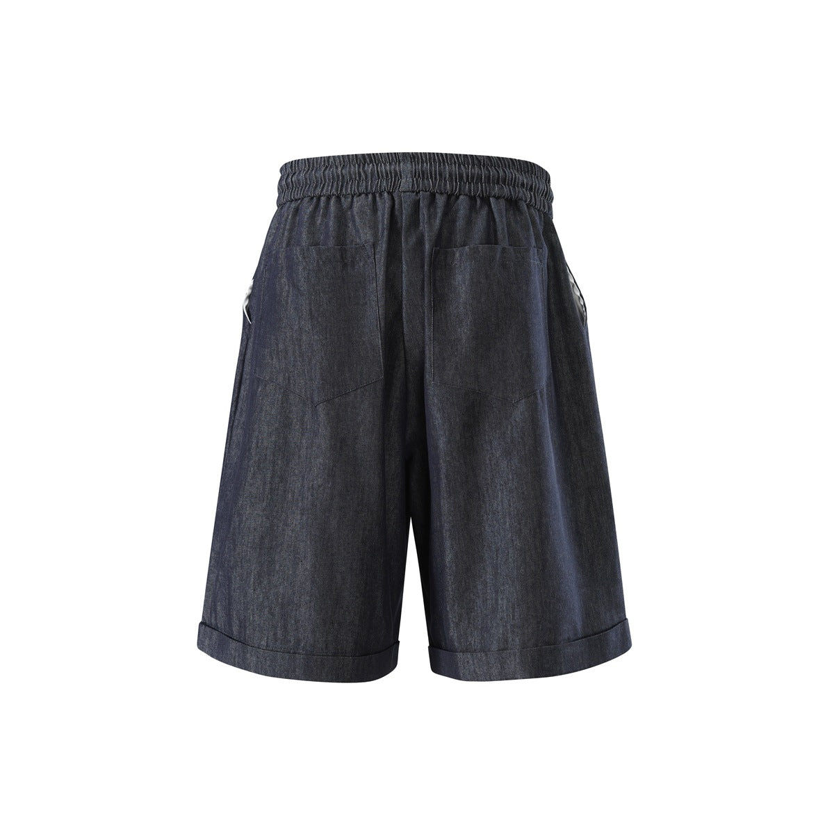 Back of dark indigo denim-look shorts showing two patch pockets, elastic waistband and rolled cuffs