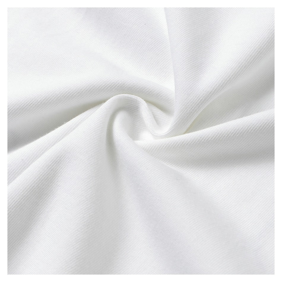 Close-up of white fabric gathered into a twist, showing its knit texture.