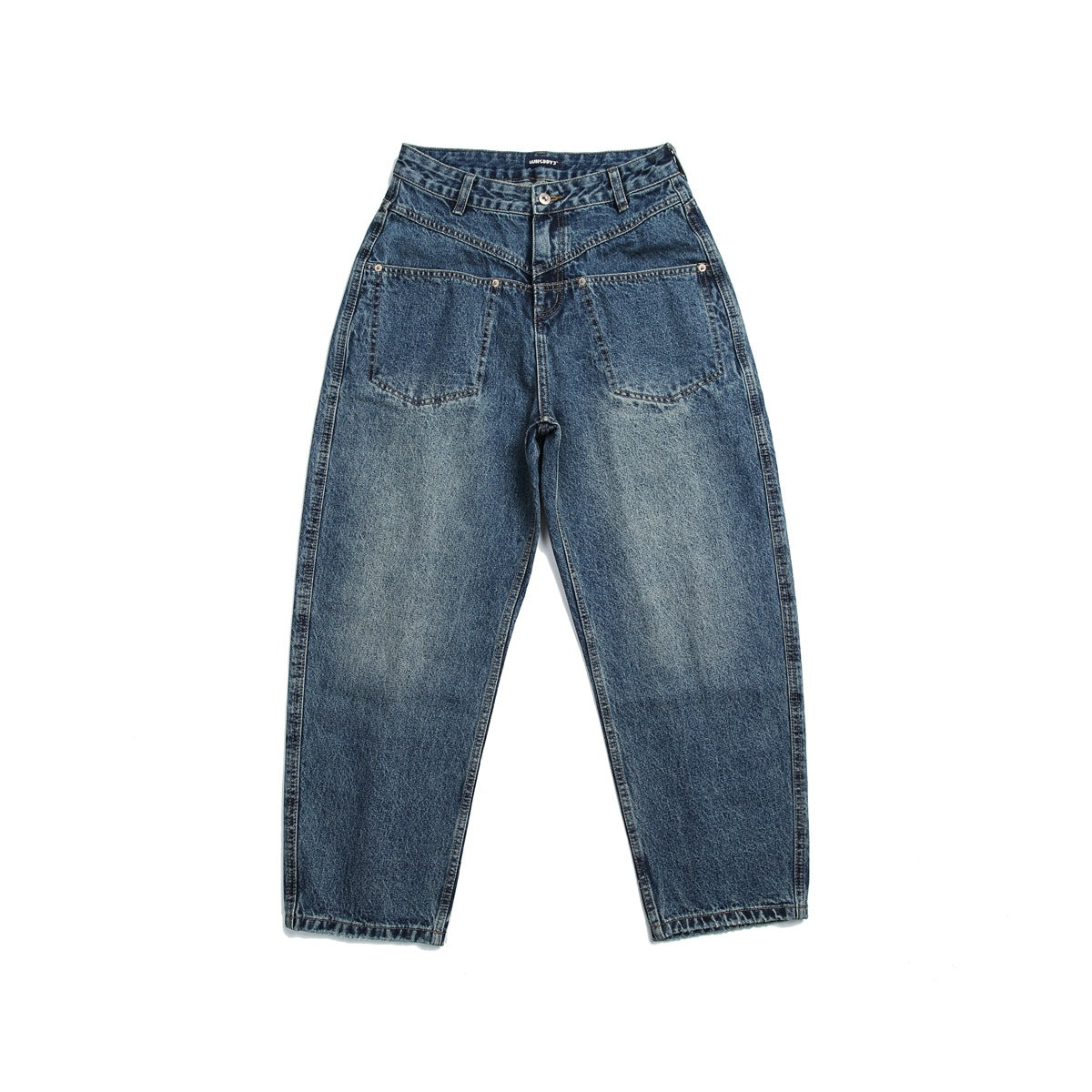 Washed blue denim jeans flat lay, front view, with V-shaped yoke seam, front pockets and tapered leg