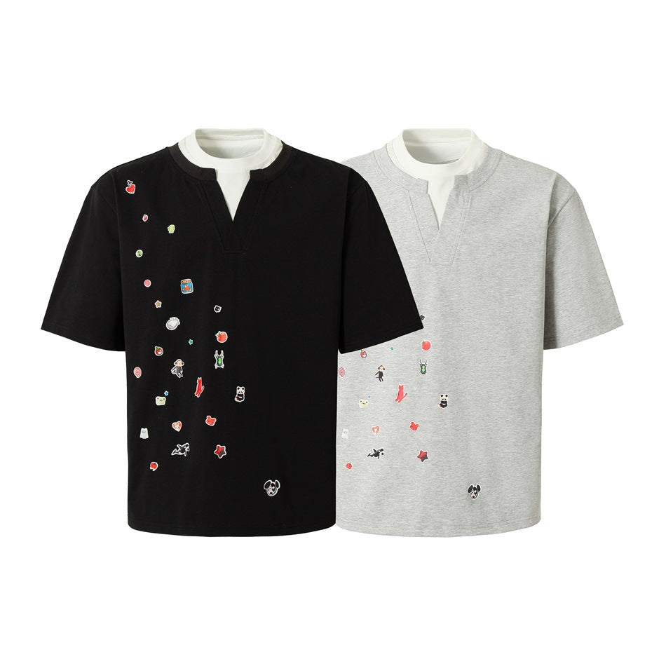 Black and light gray short-sleeve T-shirts with white layered V-notch collars and scattered small colorful motifs.