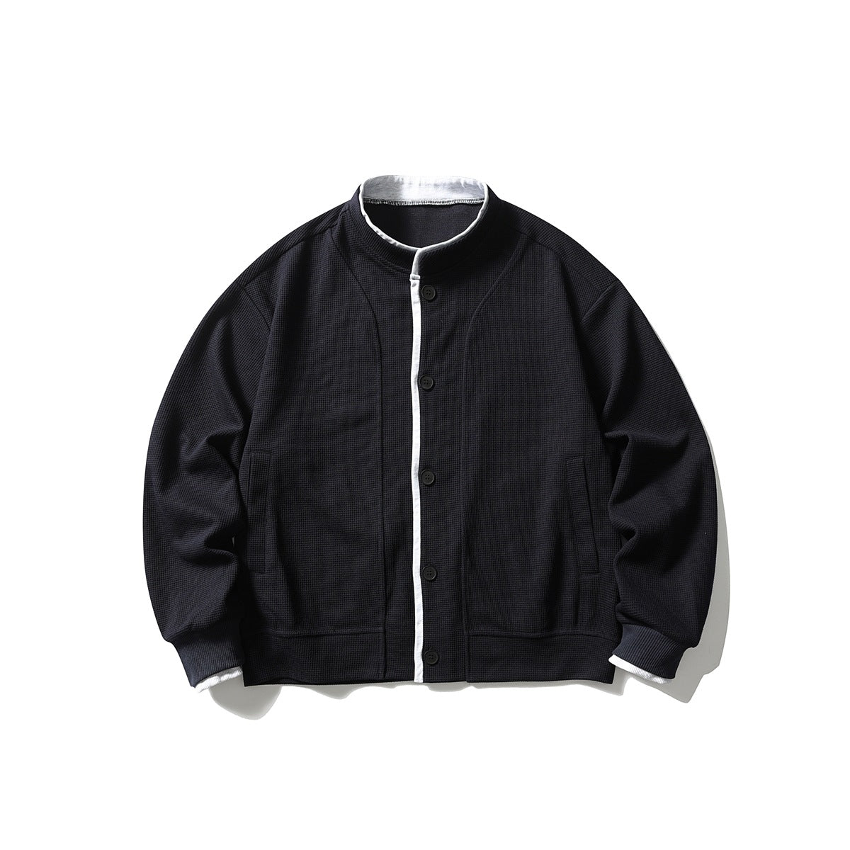 Navy waffle-knit stand-collar button jacket with white piping, flat lay front view