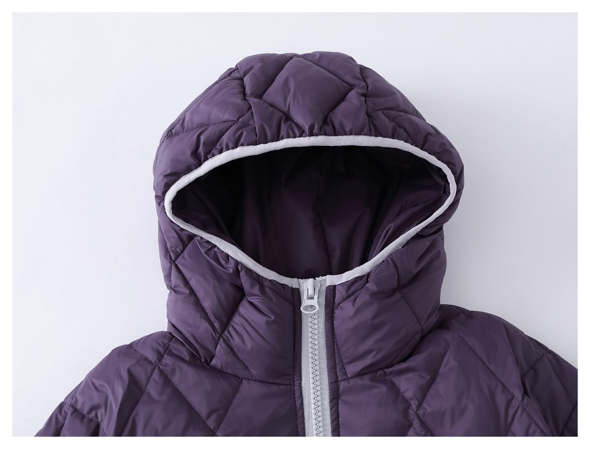 Close-up of the purple quilted jacket's hood, pale trim, dark lining, and light-colored front zipper.
