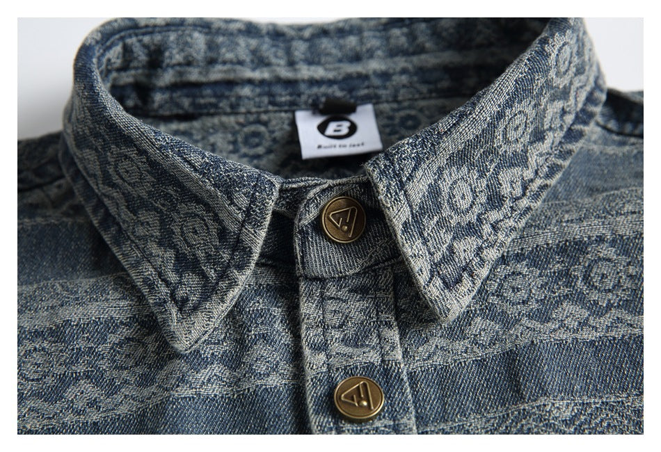 Close-up of the shirt collar, brass-tone buttons, and small B label inside the neckline.