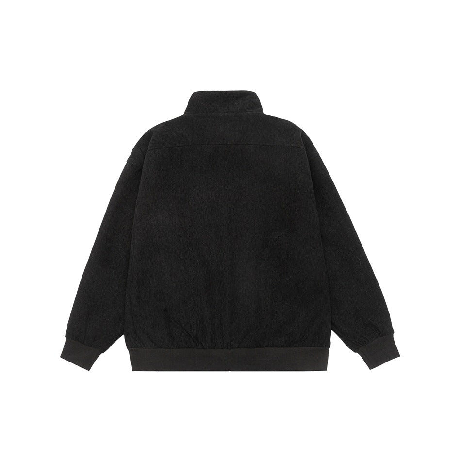 Back view of a black jacket with a stand collar, long sleeves, and dark ribbed cuffs and hem.