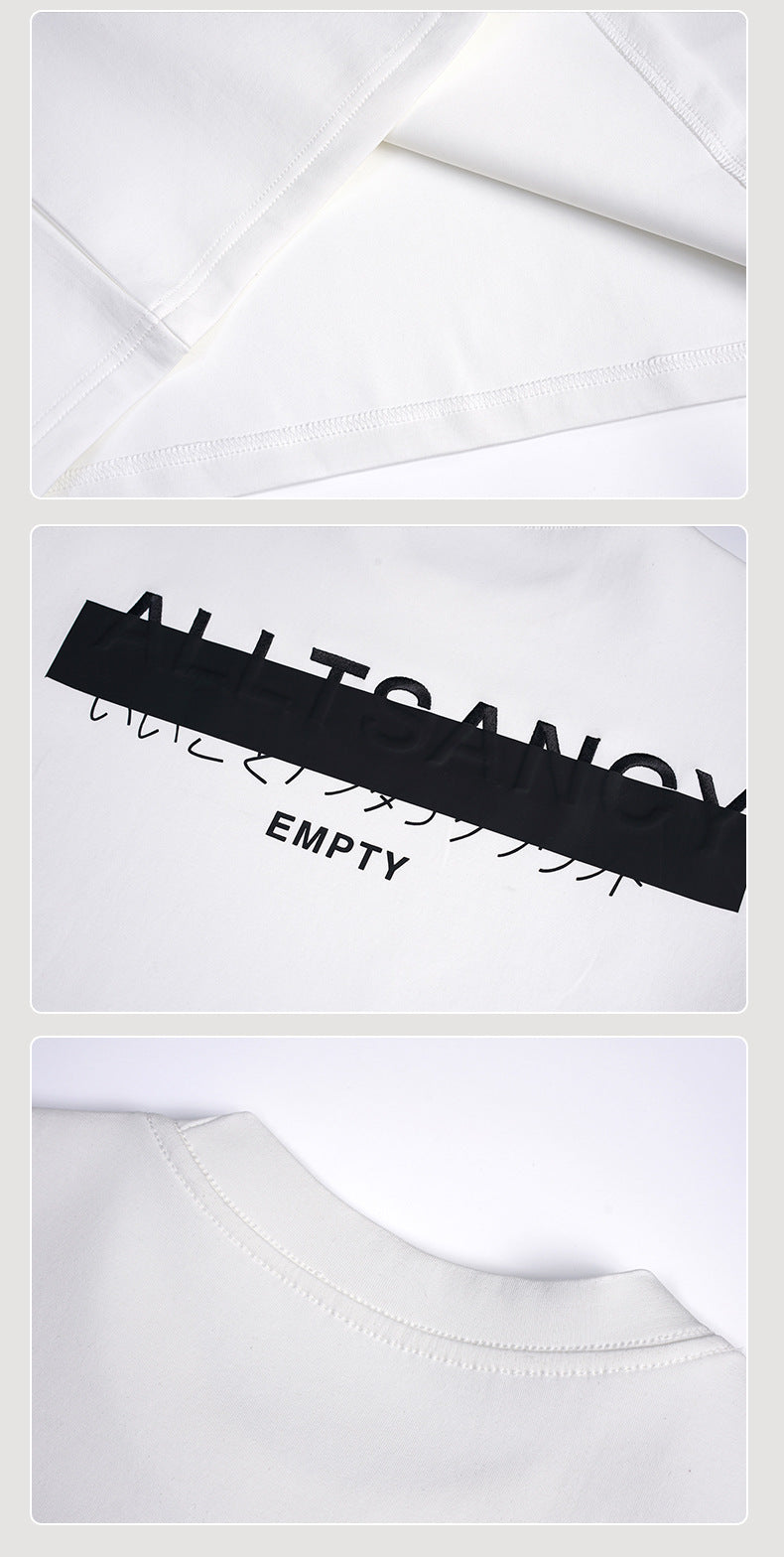 Collage showing the white T-shirt's inside seams, black chest graphic, and ribbed crew neckline.
