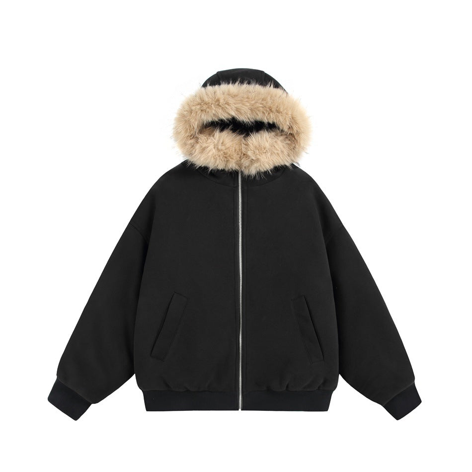 Black zip-front hooded jacket with tan fur-like hood trim, ribbed cuffs and hem, and slanted front pockets