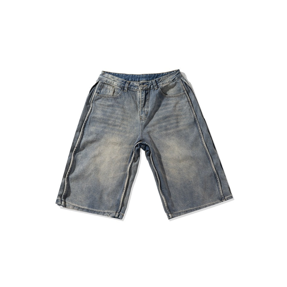 Faded blue-gray denim knee-length shorts laid flat, front view, with side seam piping and belt loops