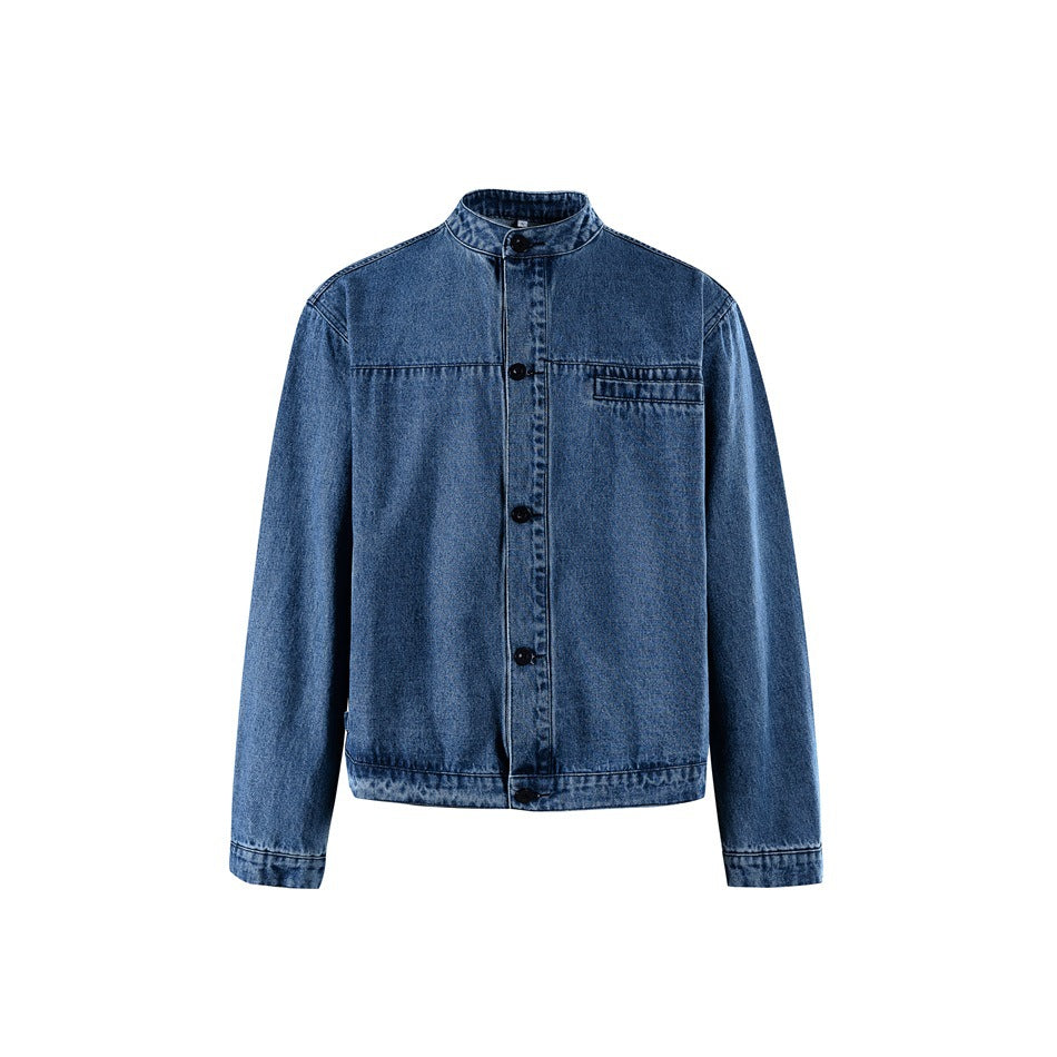 Blue washed denim jacket front view with stand collar, button front and chest welt pocket