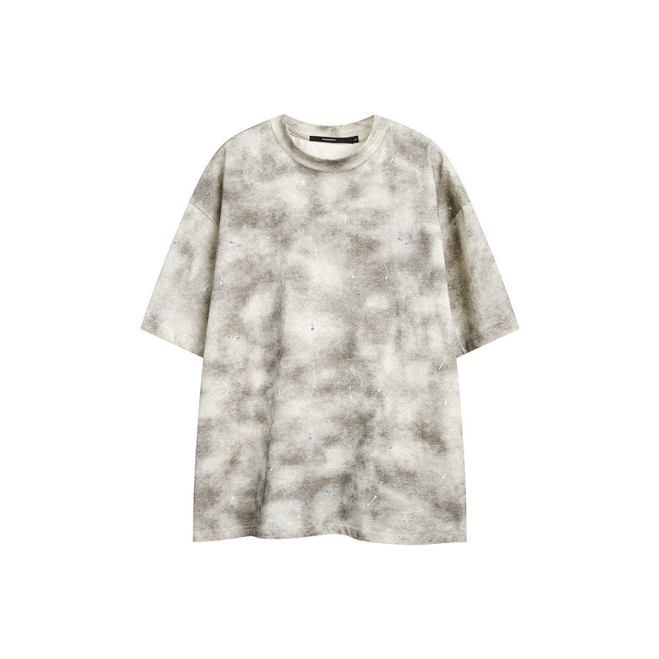 Beige and gray tie-dye short-sleeve crew-neck T-shirt with white and blue paint splatters, flat front view