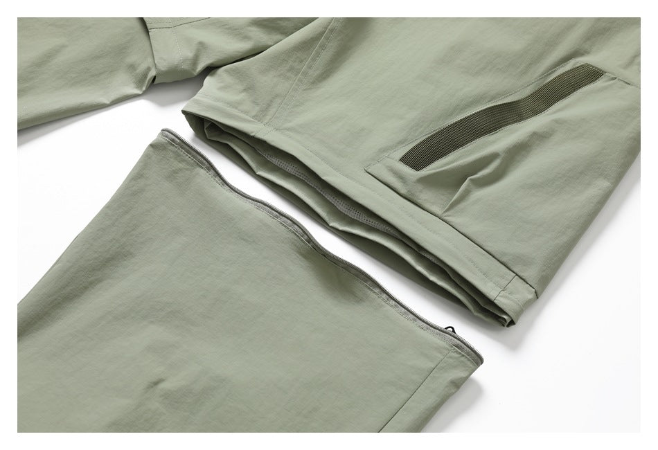 Close-up of sage-green pants showing a zippered panel and a pocket with dark mesh trim.