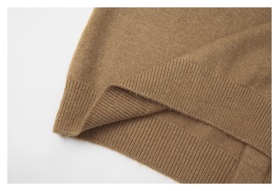 Close-up of the tan sweater's ribbed hem.