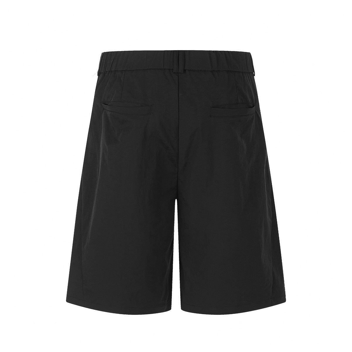 Rear view of black shorts with two welt pockets and a loop at the waistband.