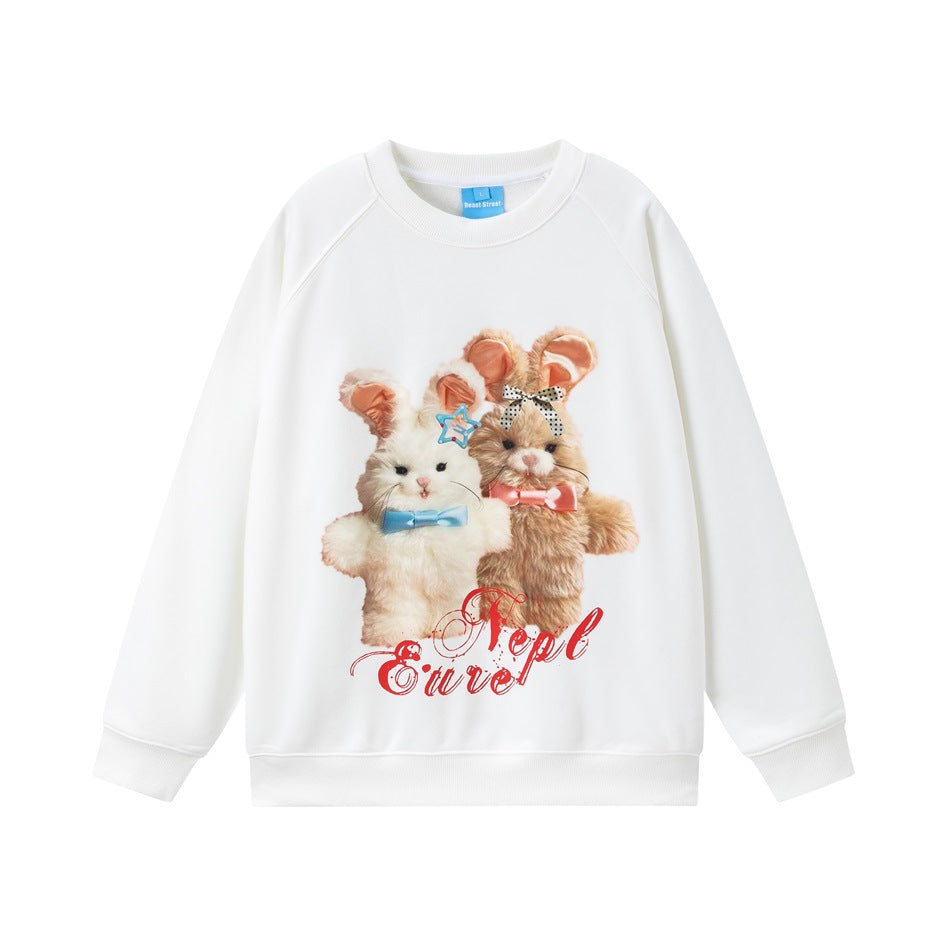 White crew-neck sweatshirt with raglan sleeves and a front print of two plush bunnies with bows and red script
