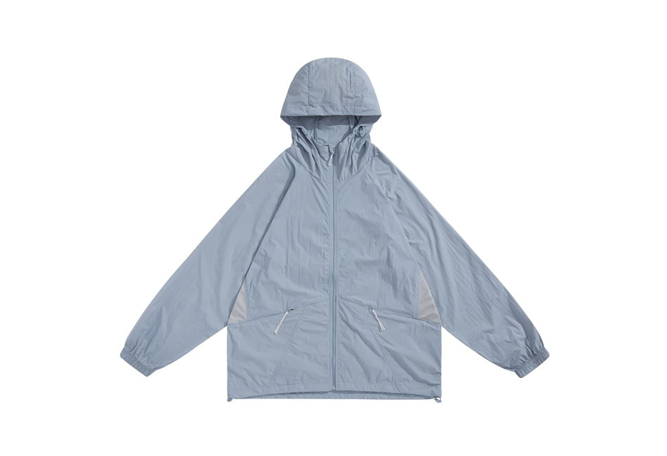 Front view of a light blue-gray hooded jacket with a front zipper and two zip pockets, displayed flat.