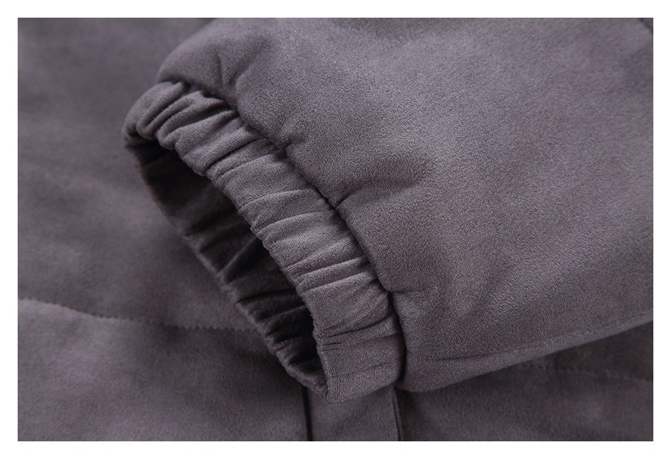 Close-up of a charcoal gray jacket sleeve with an elasticized cuff.