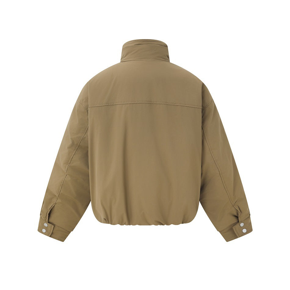 Back view of a plain khaki jacket with a high collar, long sleeves and snap-button cuffs.