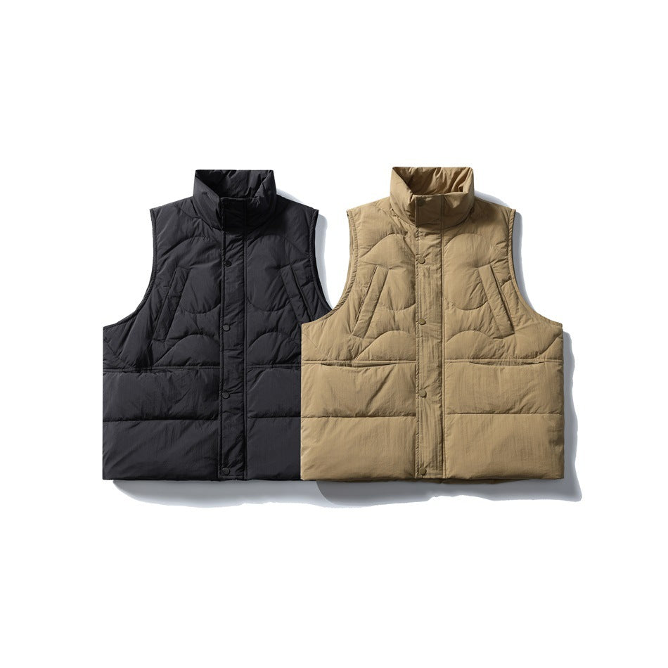 Front views of sleeveless quilted vests in black and tan, both with high collars and snap fronts.
