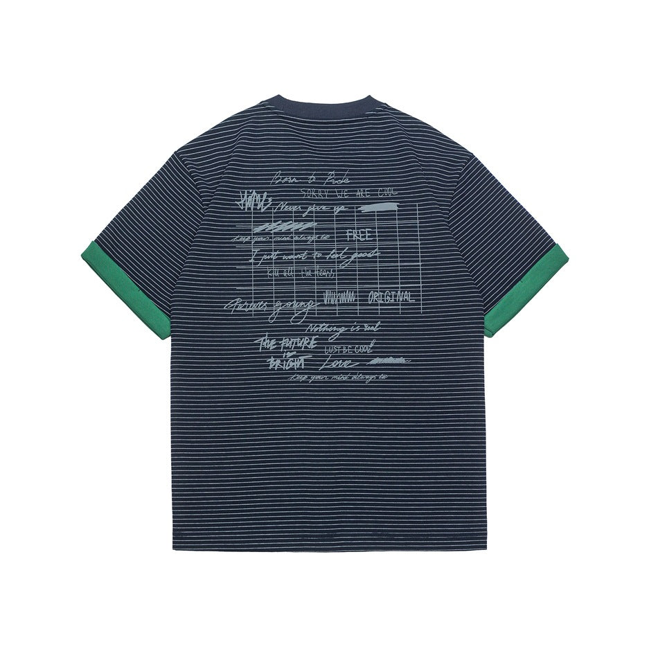 Back view of a navy T-shirt with thin light stripes, green sleeve cuffs, and a large printed text graphic.