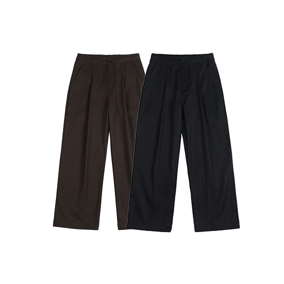 Two pairs of wide-leg pleated trousers displayed side by side in dark brown and black.