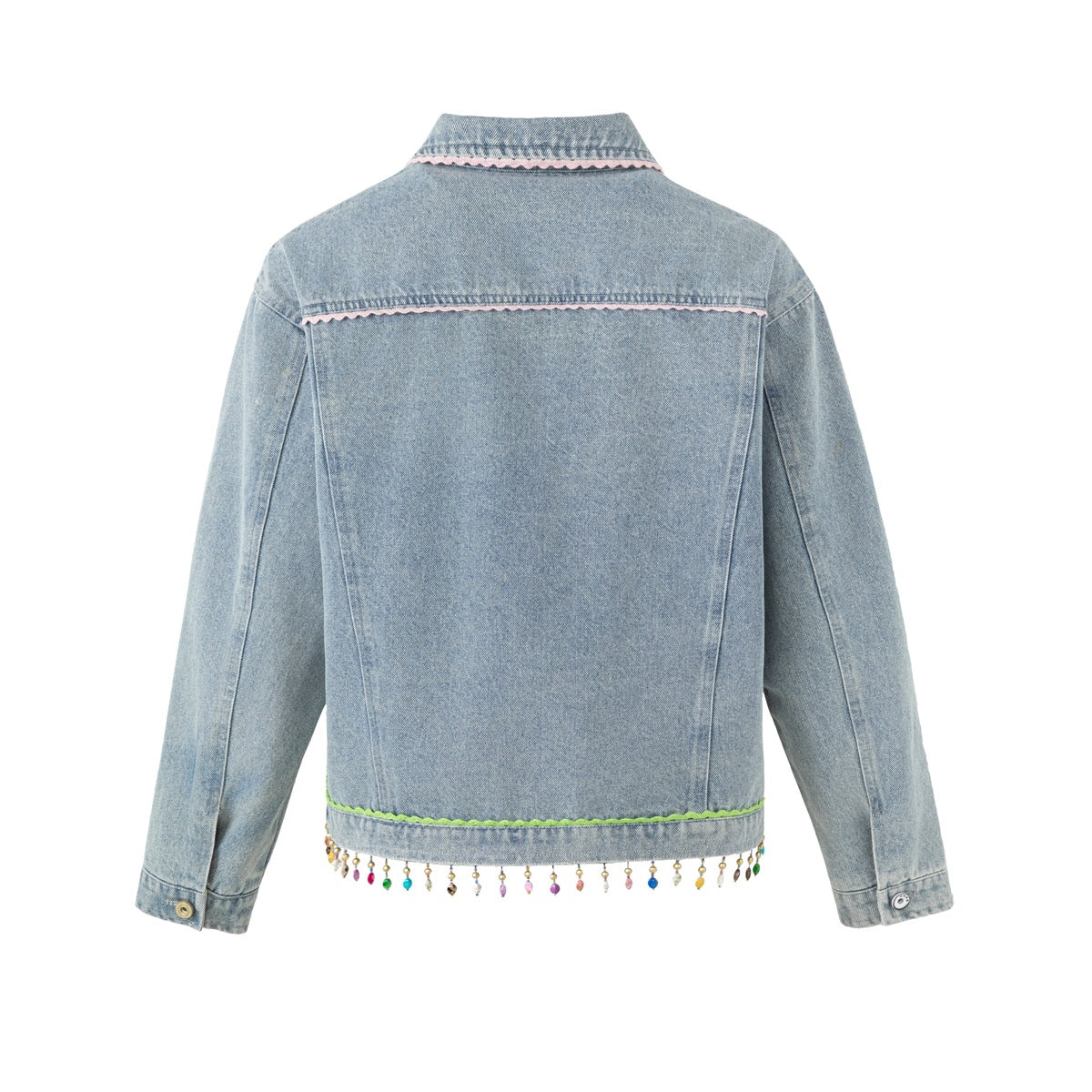 Back view of a light-blue denim jacket with pink collar trim, green hem trim and colorful dangling beads.