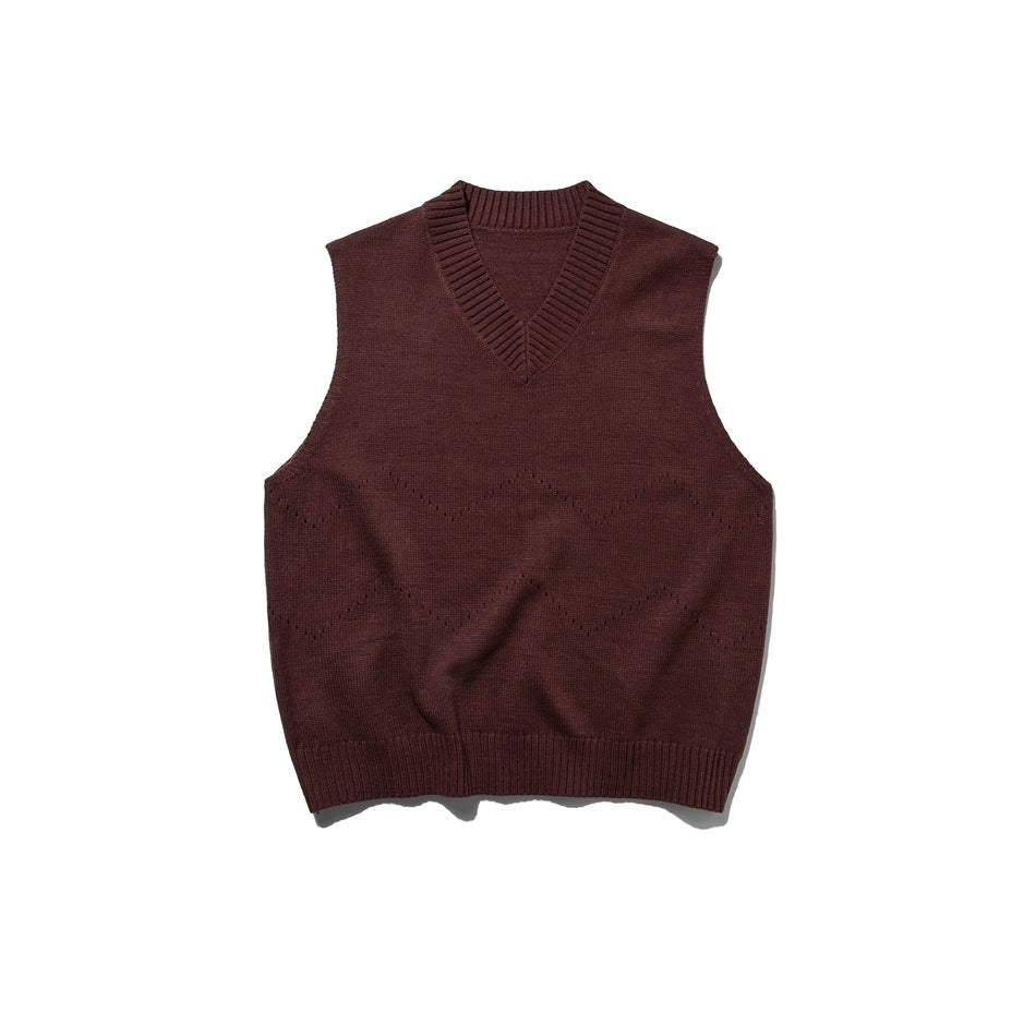 Brown knit V-neck sweater vest flat lay with ribbed neckline and hem