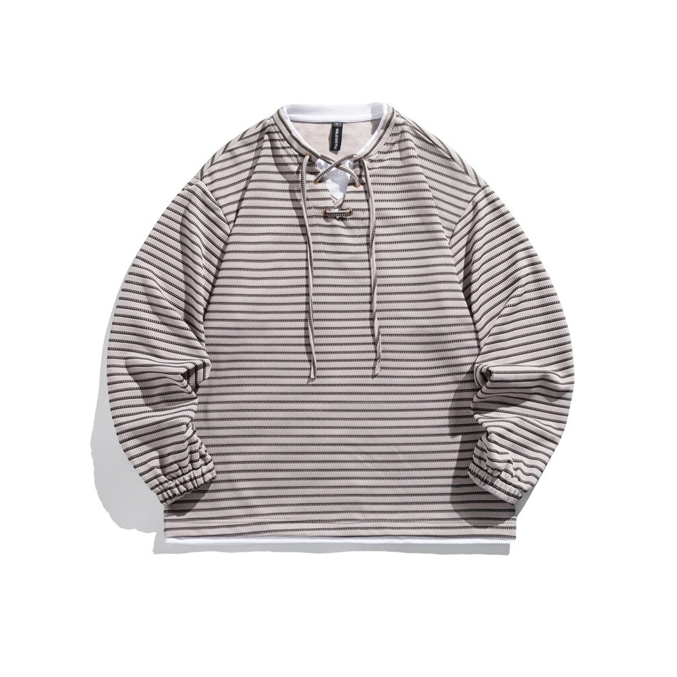 Gray-beige striped long-sleeve pullover with lace-up neckline, white layered collar and hem, flat lay