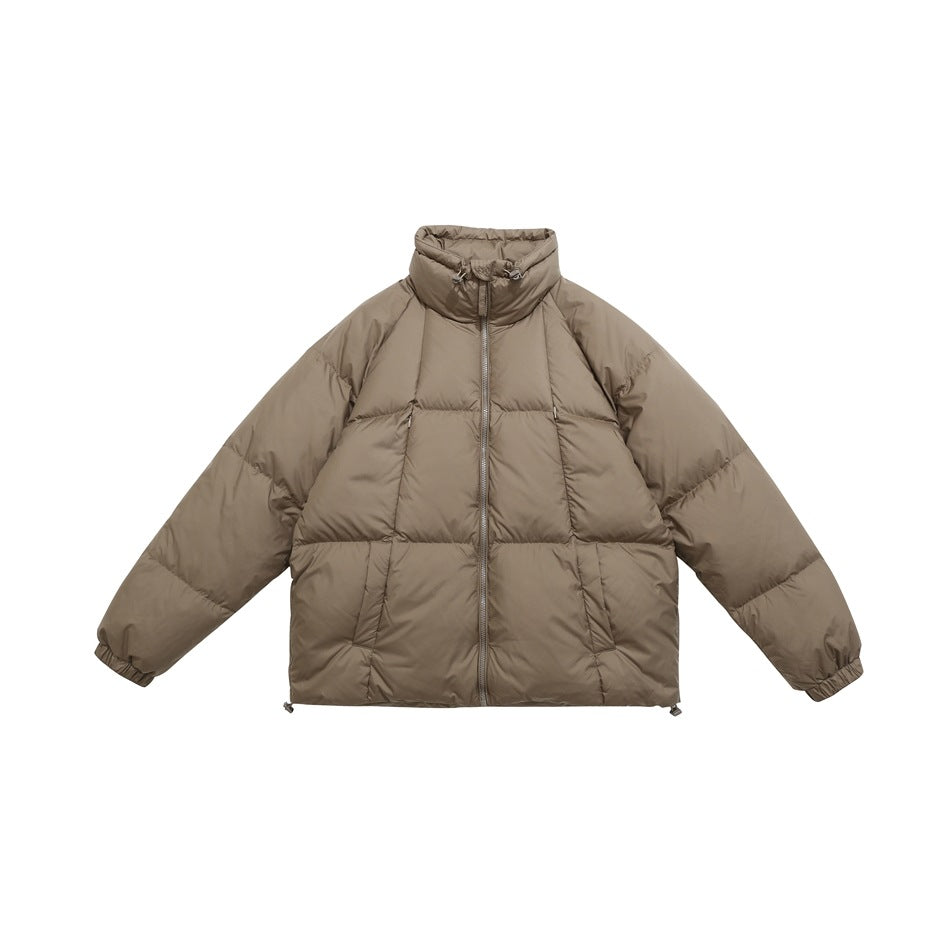 Front view of a taupe quilted puffer jacket with a high collar, full zip, and long sleeves, laid flat.