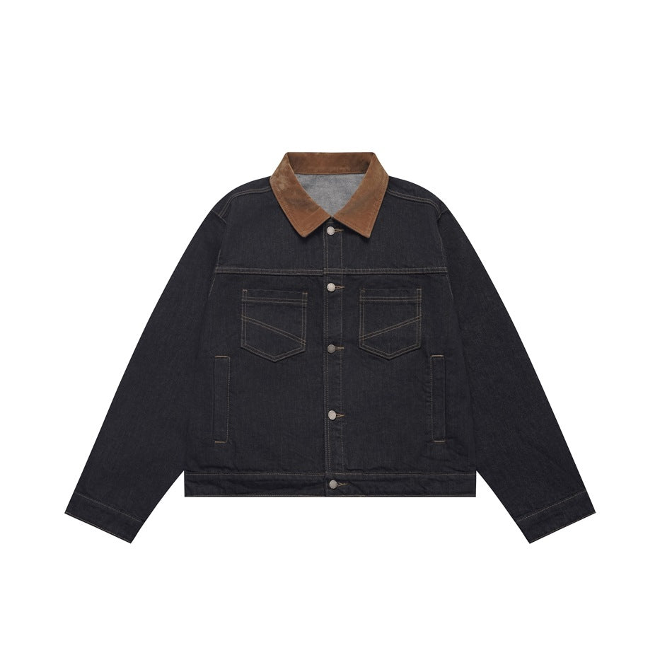 Dark indigo denim jacket with brown collar, button front, chest pockets and tan stitching, flat lay front view
