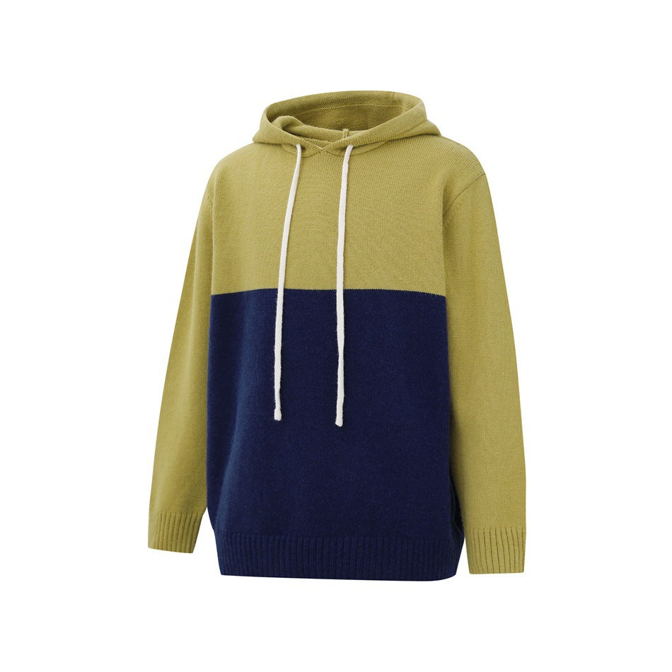 Front view of a mustard-yellow and navy color-block knitted hoodie with white drawstrings and ribbed trim.