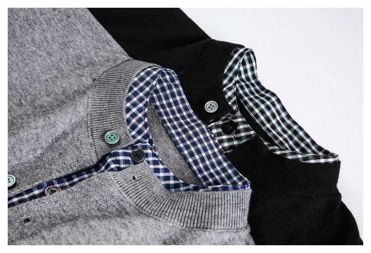 Close-up of gray and black sweater cuffs with contrasting checked fabric, ribbed edges, and buttons.