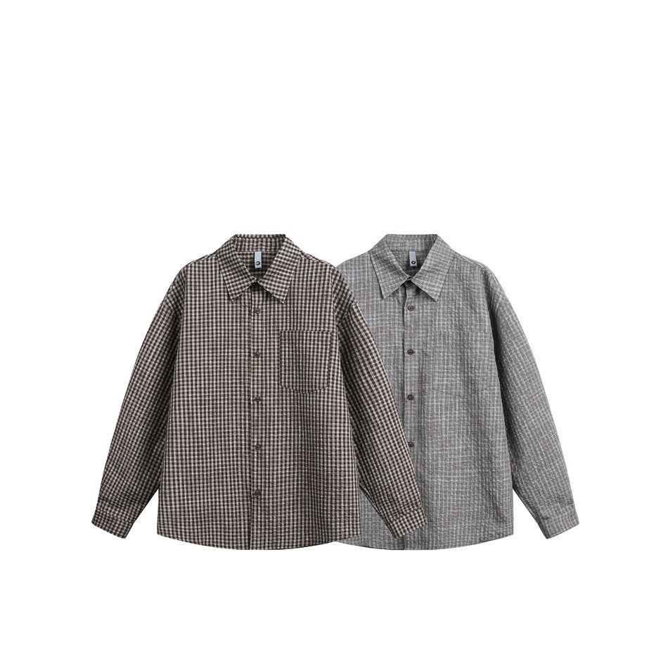Two checked button-up shirts shown together: one dark brown-and-cream and one gray with blue and tan checks.