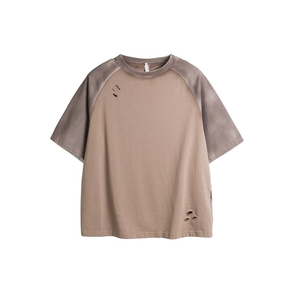 Coffee brown raglan T-shirt with faded taupe sleeves and collar and small distressed holes, flat lay front view