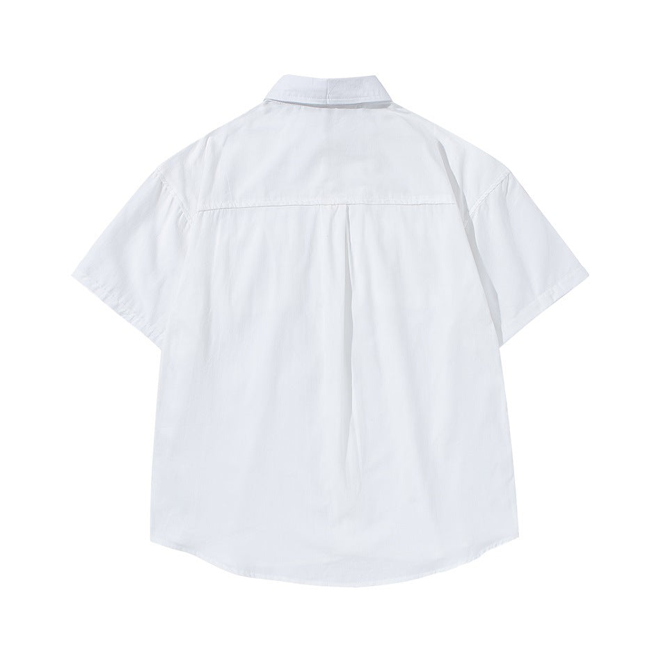 White short-sleeve shirt back view with back yoke and center pleat, flat lay