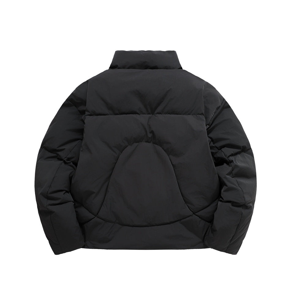 Black puffer jacket back view with stand collar and large arched quilted panel on the back