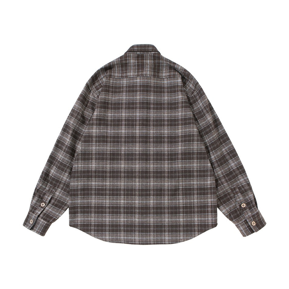 Back view of brown plaid long-sleeve shirt with yoke seam and buttoned cuffs, flat lay