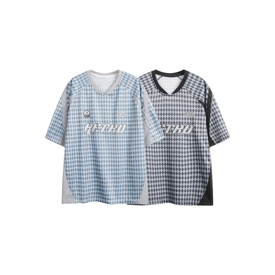 Two short-sleeve V-neck shirts with diamond patterns: one blue and light gray, the other charcoal and light gray.