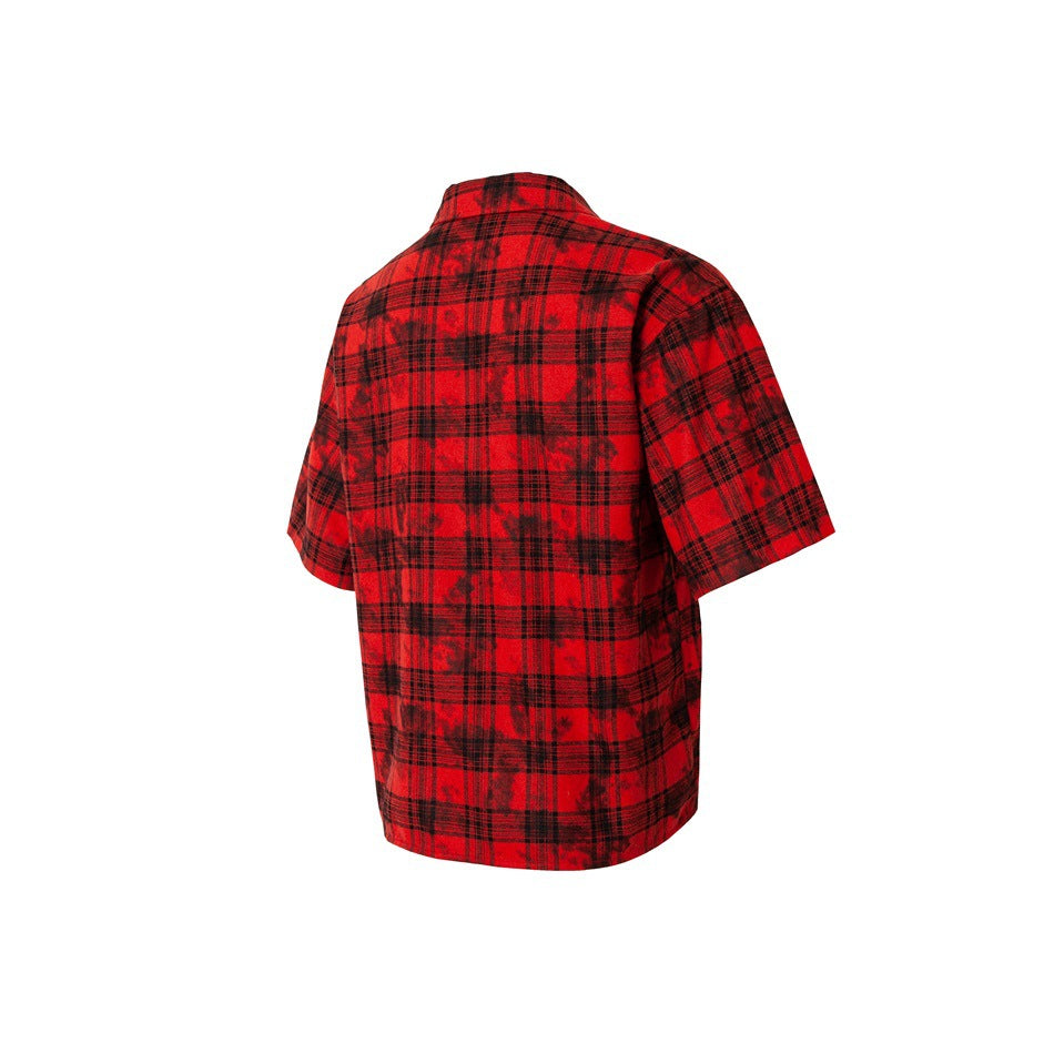 Angled back view of a red-and-black plaid short-sleeve button-up shirt on a white background.