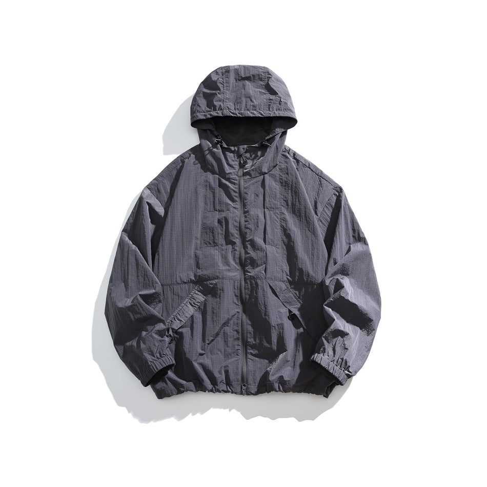 Dark gray hooded zip jacket with crinkled ripstop-style texture, flat lay front view