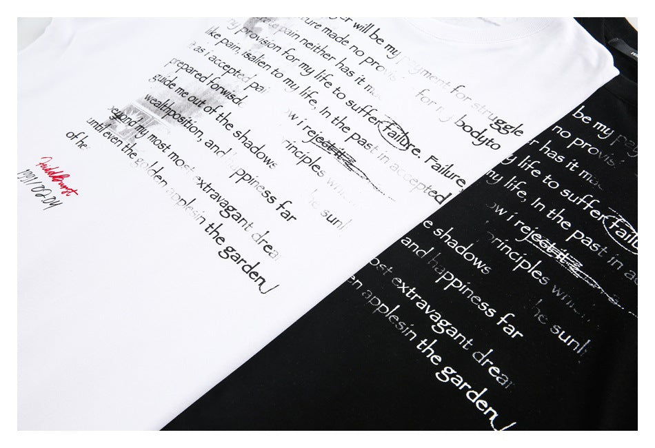 White and black T-shirts with distressed English text graphics, arranged diagonally.