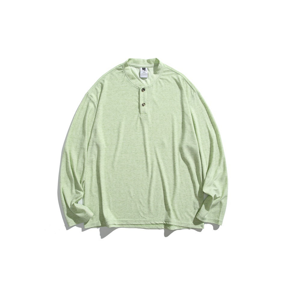 Apple green heathered long-sleeve henley top with two-button placket, flat lay front view
