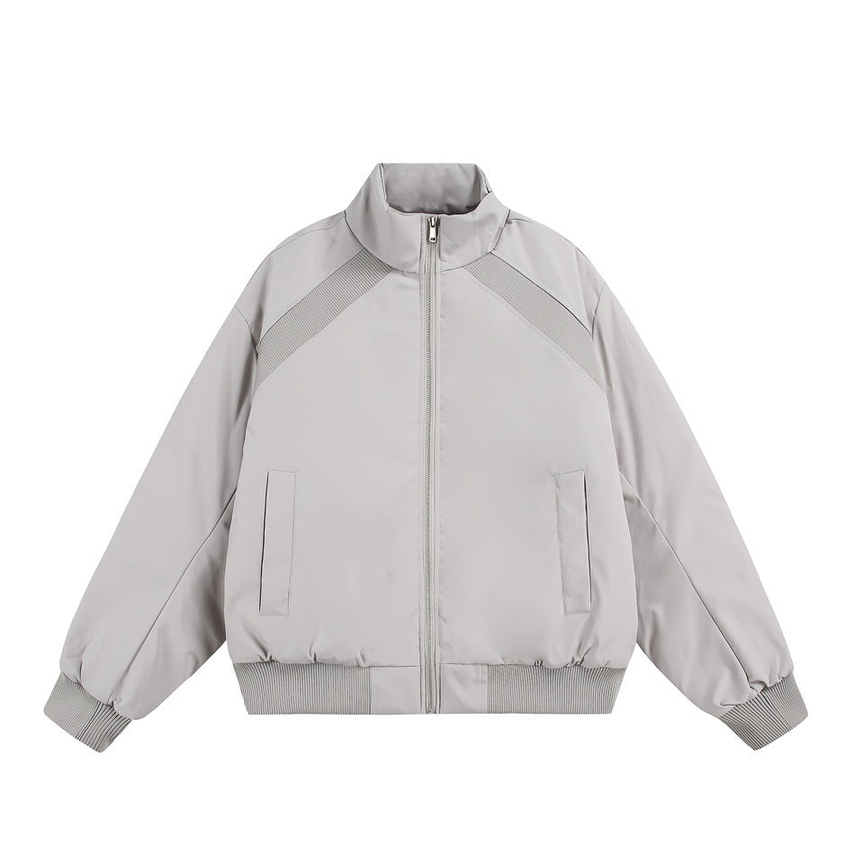 Light gray stand-collar zip jacket with ribbed shoulder panels, cuffs and hem, front view on white background