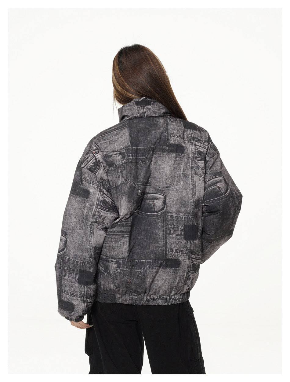 Back view of a model wearing a charcoal patchwork-print padded jacket with an elastic hem.