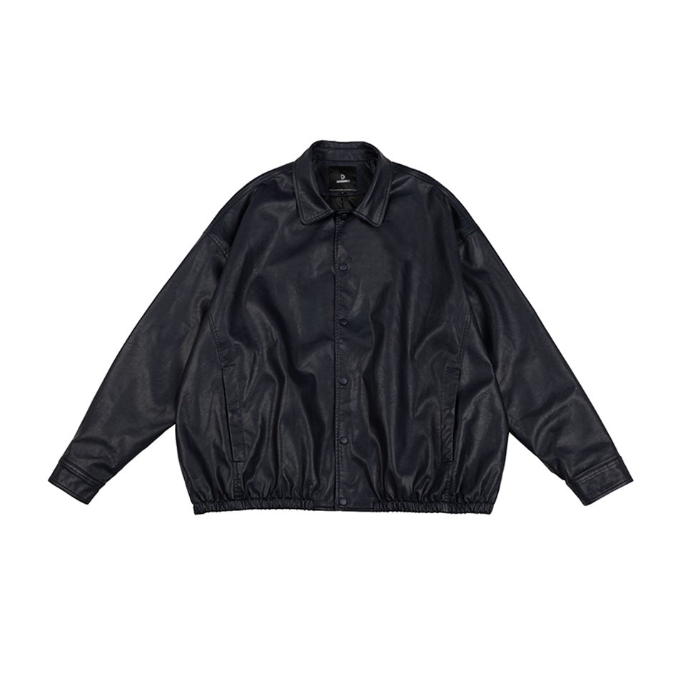 Black collared jacket with snap-button front, side pockets, long sleeves and an elasticated hem, shown flat.