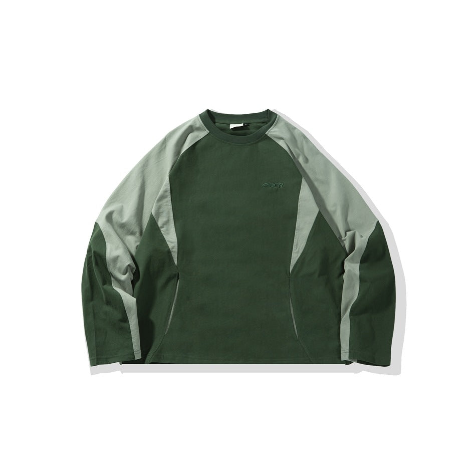 Green long-sleeve crew-neck top with light sage raglan sleeve panels and small tonal chest embroidery, flat front view