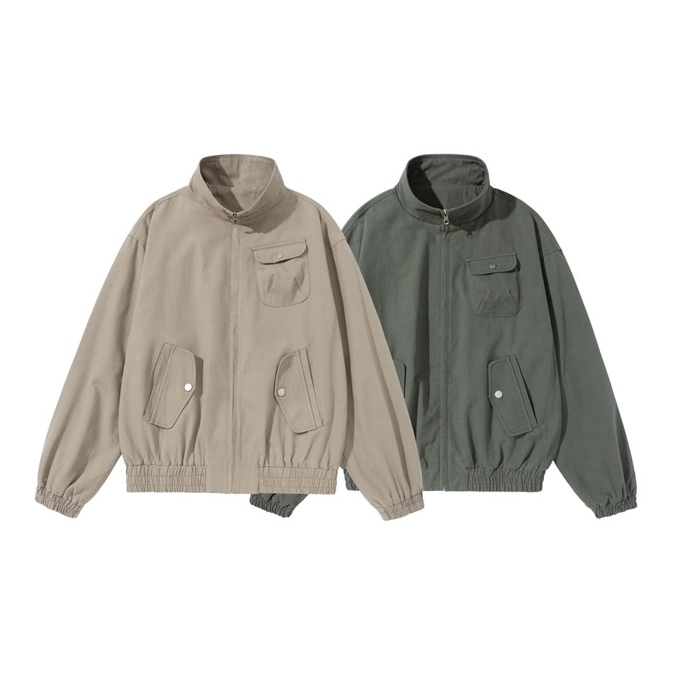 Two front-view jackets shown flat: one beige and one olive, each with a stand collar, zipper, and multiple snap pockets.