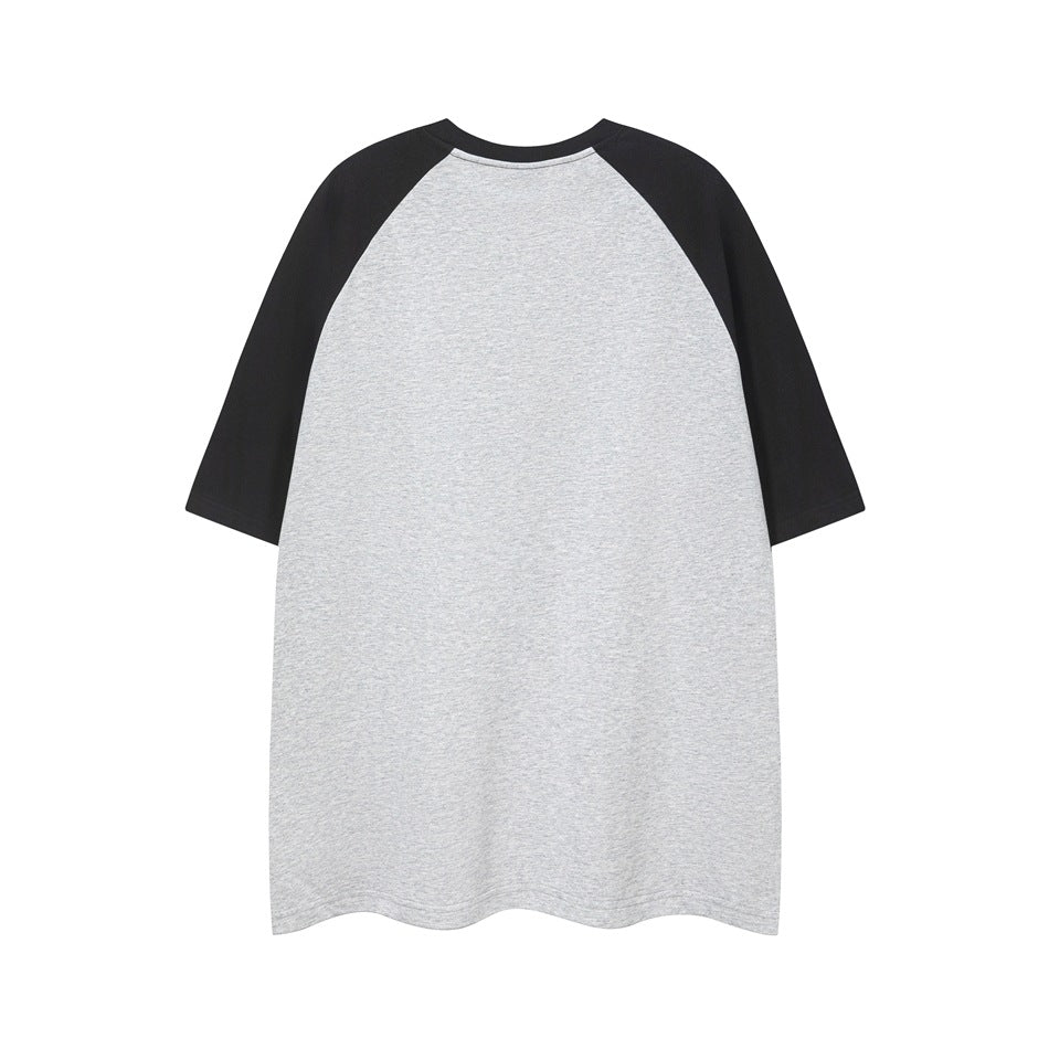 Back view of a gray T-shirt with black raglan sleeves and a plain, unprinted body.