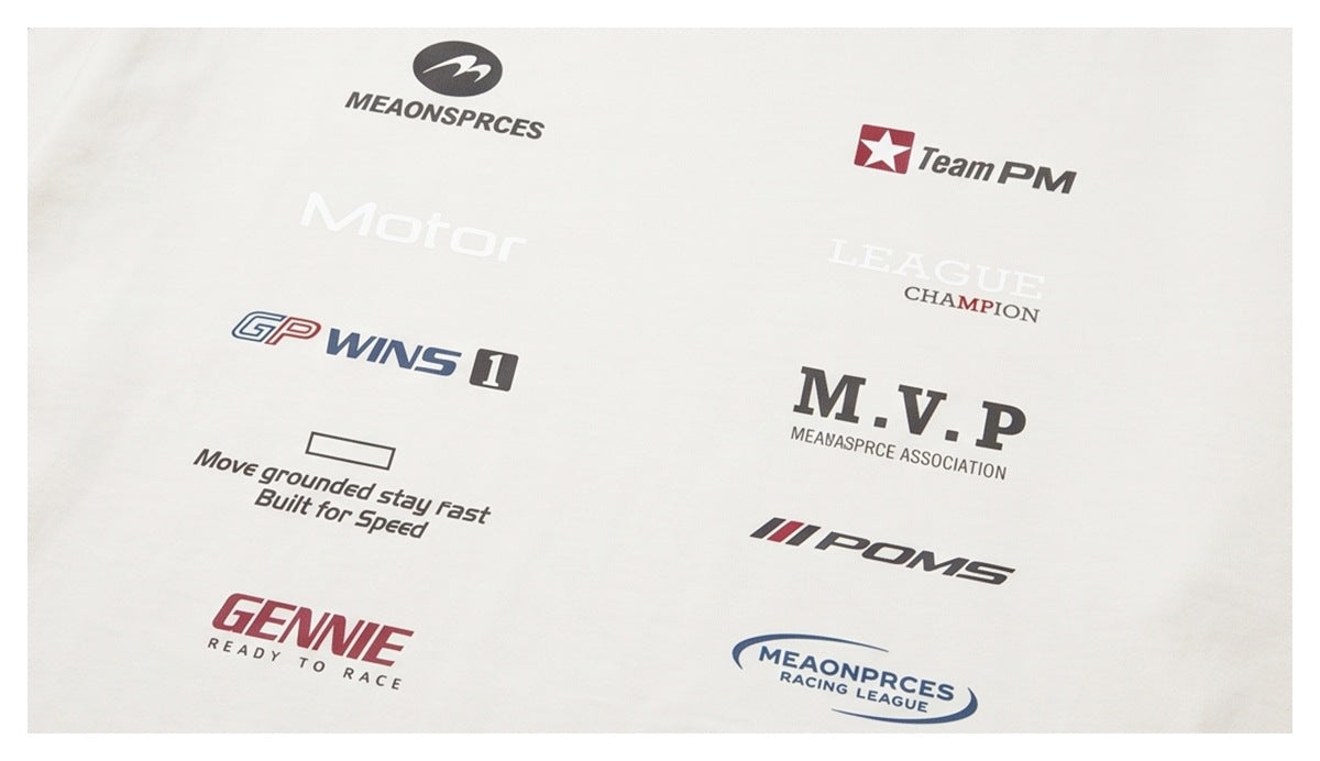 Close-up of assorted racing-style words and logos printed on white shirt fabric.