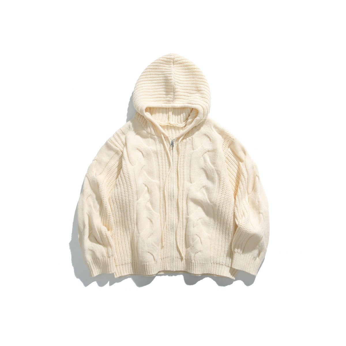 Cream cable-knit zip-up hooded sweater with drawstrings, flat lay on white background